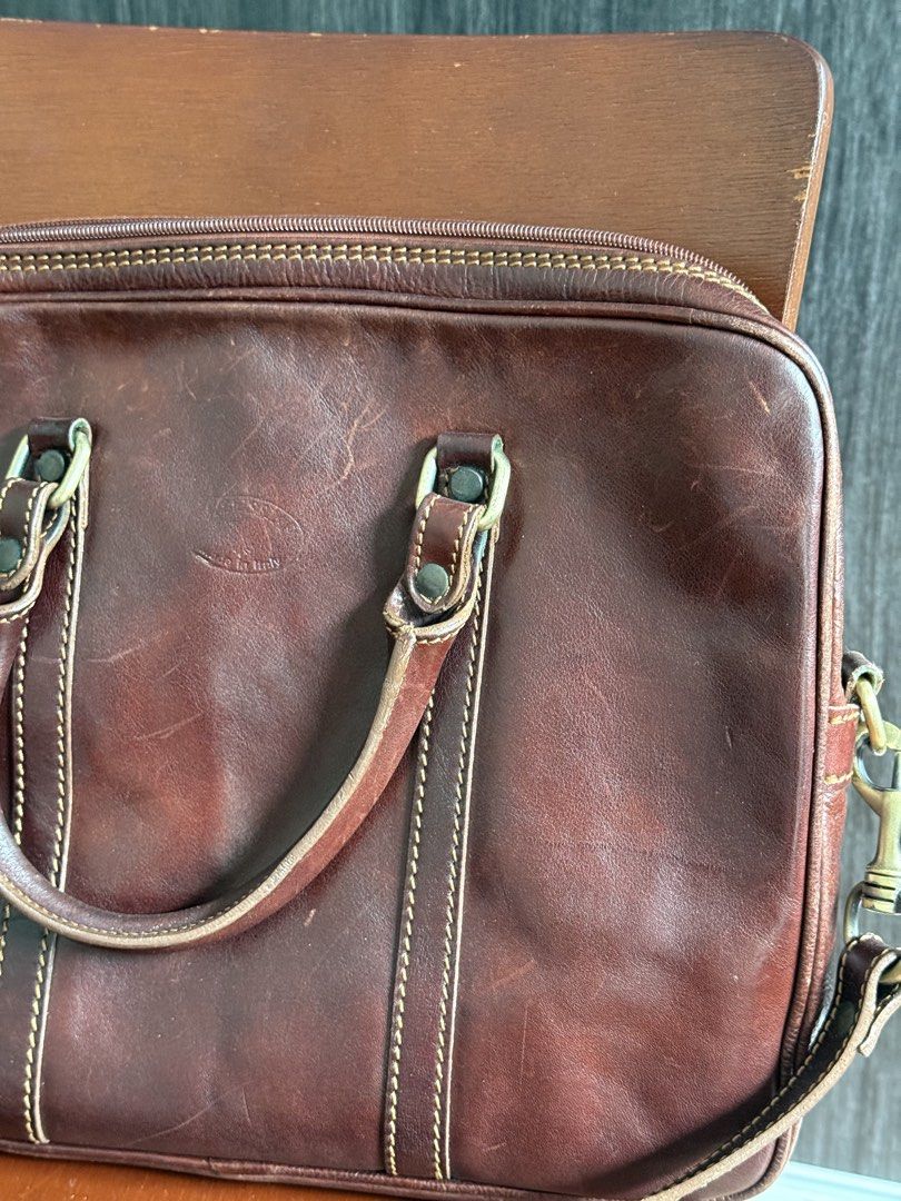 Leather briefcase from Florence (Category: Luxury Bags & Wallets) located in Pasig City. Submitted by francis.koa (Listing ID 1426225746, Image 2). Description: I bought this briefcase from Florence, Italy last 2019. It was from the local market from a random local artisan. They used really good leather for this briefcase. Can fit 15 inch laptop (shown in photo).