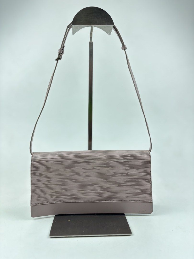 Louis Vuitton Lilac Epi Leather Honfleur (Category: Luxury Bags & Wallets) located in Makati City. Submitted by ragrepository (Listing ID 1426209852, Image 1). Description: Louis Vuitton Lilac Epi Leather Honfleur Clutch Bag Height-4” Width-8.5” Depth- 1” Handle drop-9.5” Condition-8/10 Flaw-Signs of wear, needs cleaning .