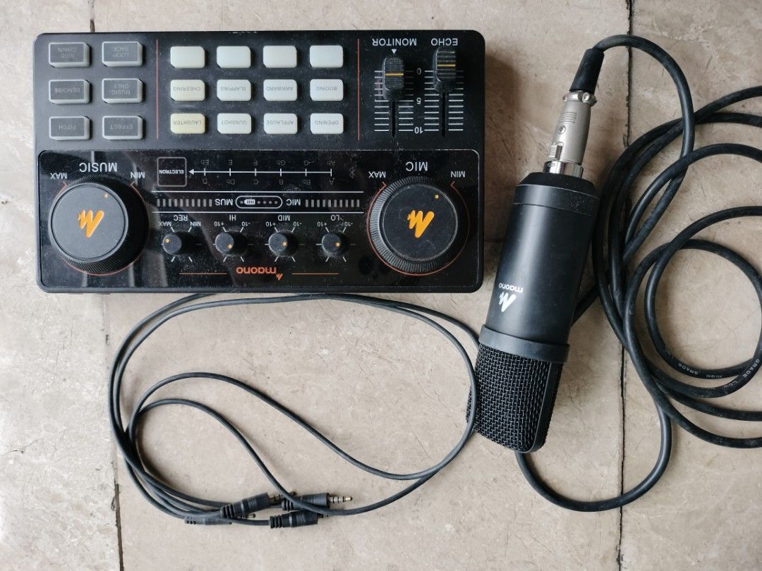 Maono Sound Card and Microphone Set (Category: Microphones) located in Calamba. Submitted by s3r3s4 (Listing ID 1426243070, Image 3). Description: Maono sound card and microphone set is perfect for recording or live streaming. It includes a sound card with various controls for echo, monitor, and music levels. The set also comes with a microphone and connecting cables. The sound card has multiple buttons and knobs for adjusting audio settings. The