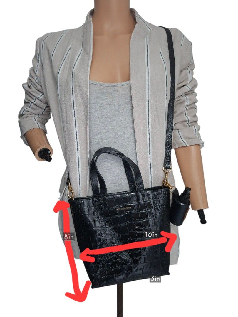 Marja Kurki - Black Croc-Embossed 2Way Bag (Category: Tote Bags) located in Rizal. Submitted by KCS0001 (Listing ID 1422973959, Image 2). Description: - With minimal flaws (rubber lining issue - body and handles) -- selling low - 1800 down to 1300 - Black 2way bag - Croc-embossed texture - Top handle and detachable shoulder strap - Gold-toned hardware - Structured design - Suitable for everyday use.