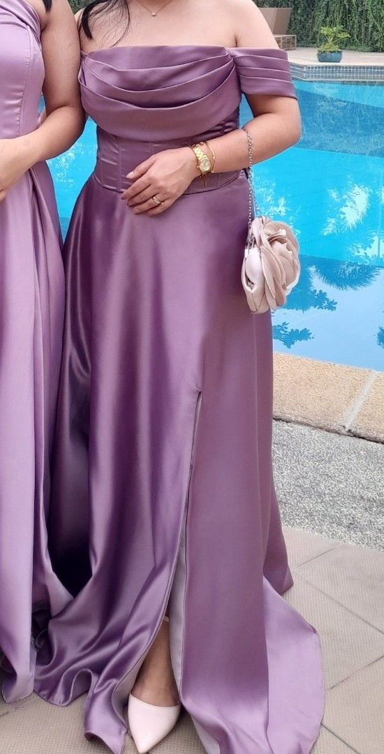 Mauve Off-Shoulder Gown with slit (Category: Evening dresses & gowns) located in Paranaque City. Submitted by xtiina27 (Listing ID 1426252503, Image 2). Description: Mauve Gown used once for medium body frame corset back (lace up) with slit duchess satin fabric.