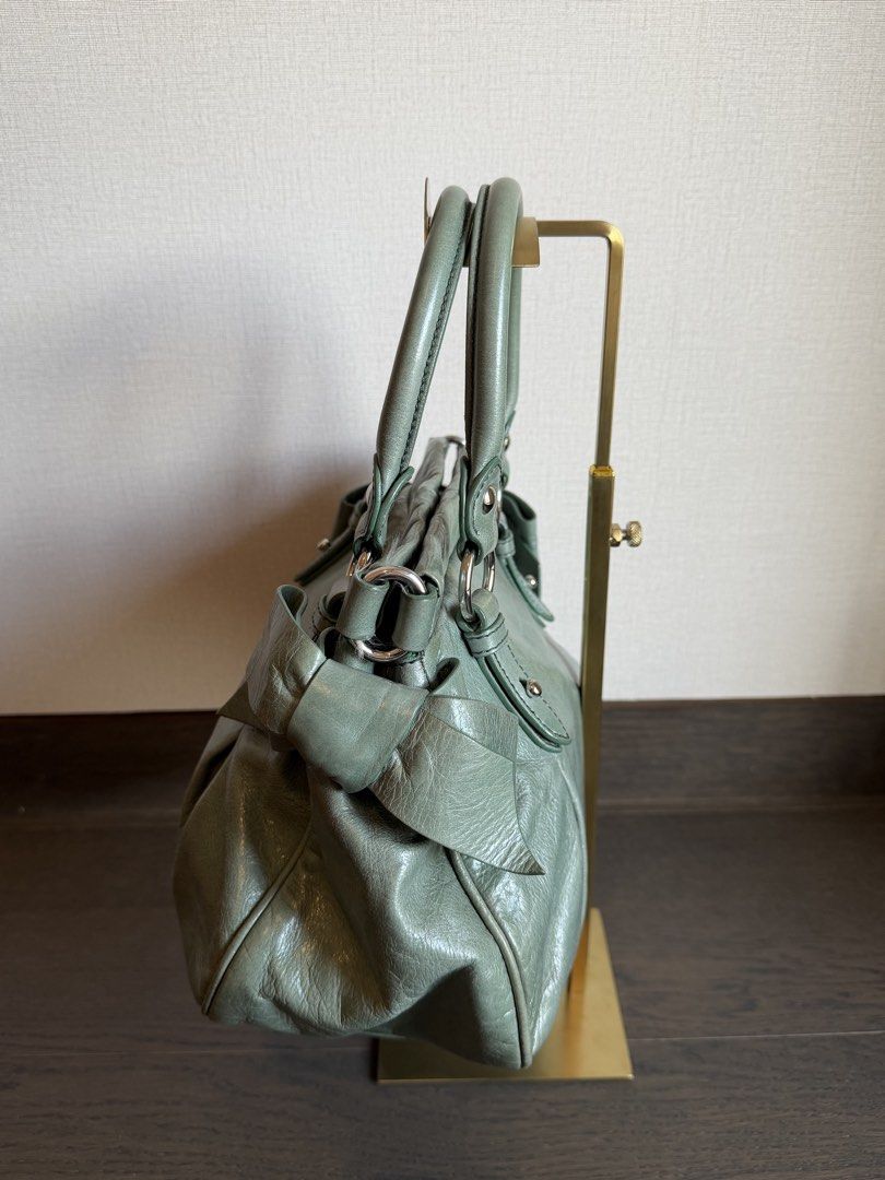 Miu Miu Vitello St Dain Handbag (Category: Luxury Bags & Wallets) located in Manila. Submitted by mr.arnie (Listing ID 1426269509, Image 2). Description: Complete set with dustbag, strap and card Like new barely used Buyer shoulders delivery fee.