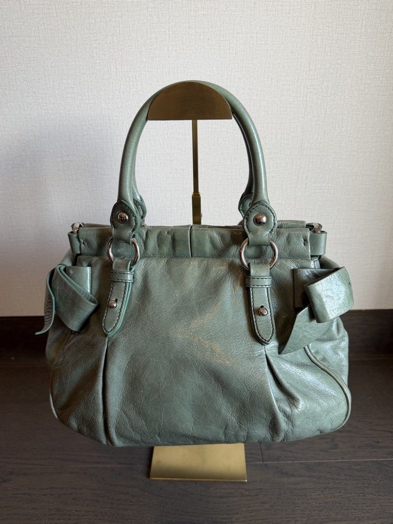 Miu Miu Vitello St Dain Handbag (Category: Luxury Bags & Wallets) located in Manila. Submitted by mr.arnie (Listing ID 1426269509, Image 3). Description: Complete set with dustbag, strap and card Like new barely used Buyer shoulders delivery fee.