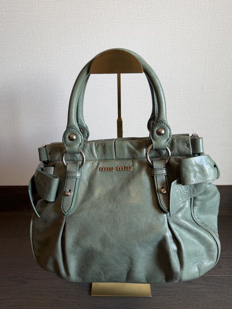 Miu Miu Vitello St Dain Handbag (Category: Luxury Bags & Wallets) located in Manila. Submitted by mr.arnie (Listing ID 1426269509, Image 1). Description: Complete set with dustbag, strap and card Like new barely used Buyer shoulders delivery fee.