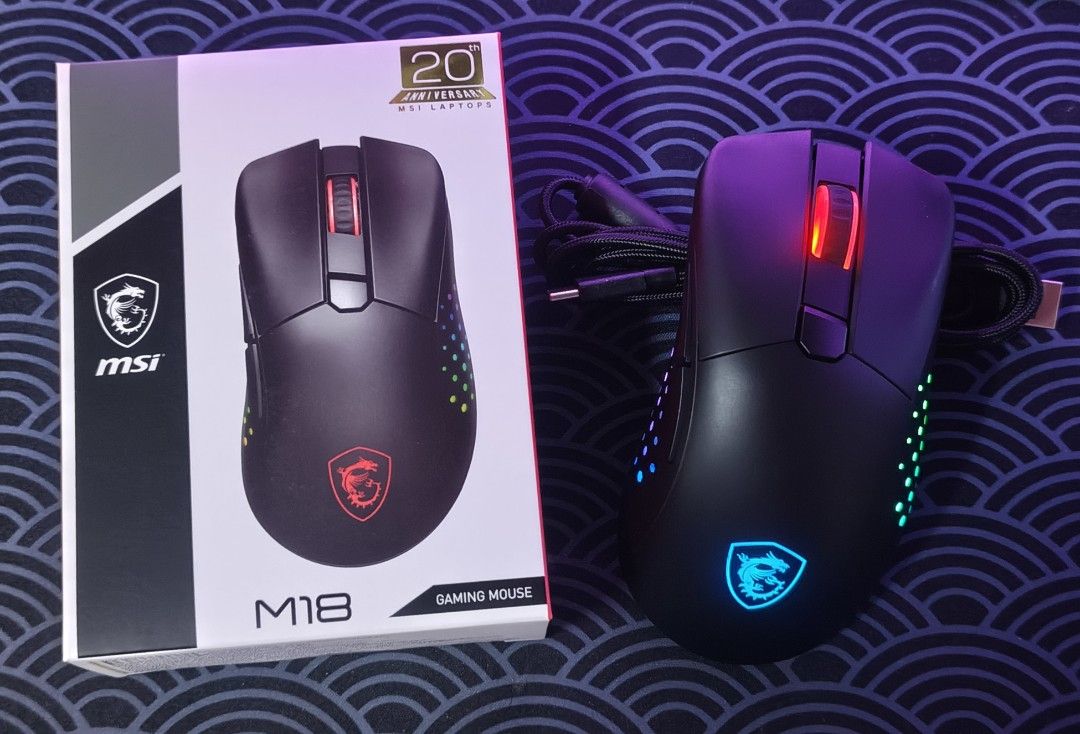 MSI M18 WIRELESS GAMING MOUSE (Category: Mouse & Mousepads) located in Malabon City. Submitted by tipiditykicks2.0 (Listing ID 1426201752, Image 2). Description: MSI M18 GAMING MOUSE (Wired / Wireless) Tri-mode connectivity • Wired • 2.4ghz • Bluetooth 6-Level DPI presets upto 5,000 3 RGB Lighting effects 20million Clicks switch life 5V-5000mA Weight: 116 grams Size: 131 x 76 x 33mm Malabon City Area Also can sell in bulk 🔥 .