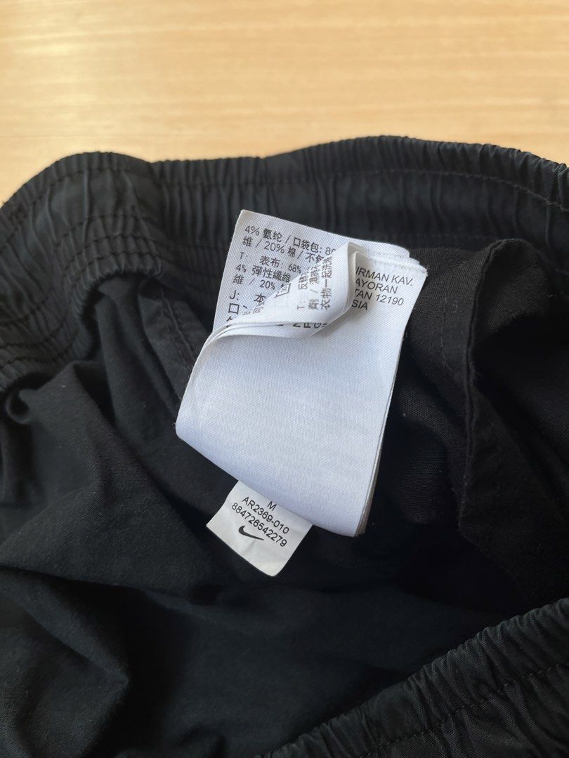 Nike Black Track Pants - Size M (Embroidered) (Category: Joggers) located in Bolinao. Submitted by clutchhh (Listing ID 1426223697, Image 3). Description: No issue ❌ Width: 30-34 Length: 37 .