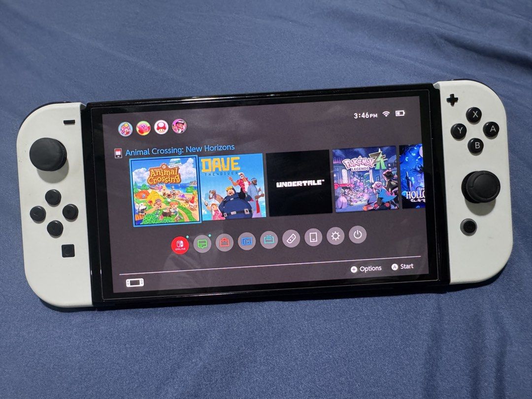 Nintendo Switch OLED (Category: Nintendo) located in Manila. Submitted by cyanide720 (Listing ID 1426256767, Image 1). Description: Nintendo Switch OLED Included: -Unit -Dock -HDMI cable -Charger -Joycon white -Joycon Grip -Dobe controllers 2 pcs RFS: upgrade.