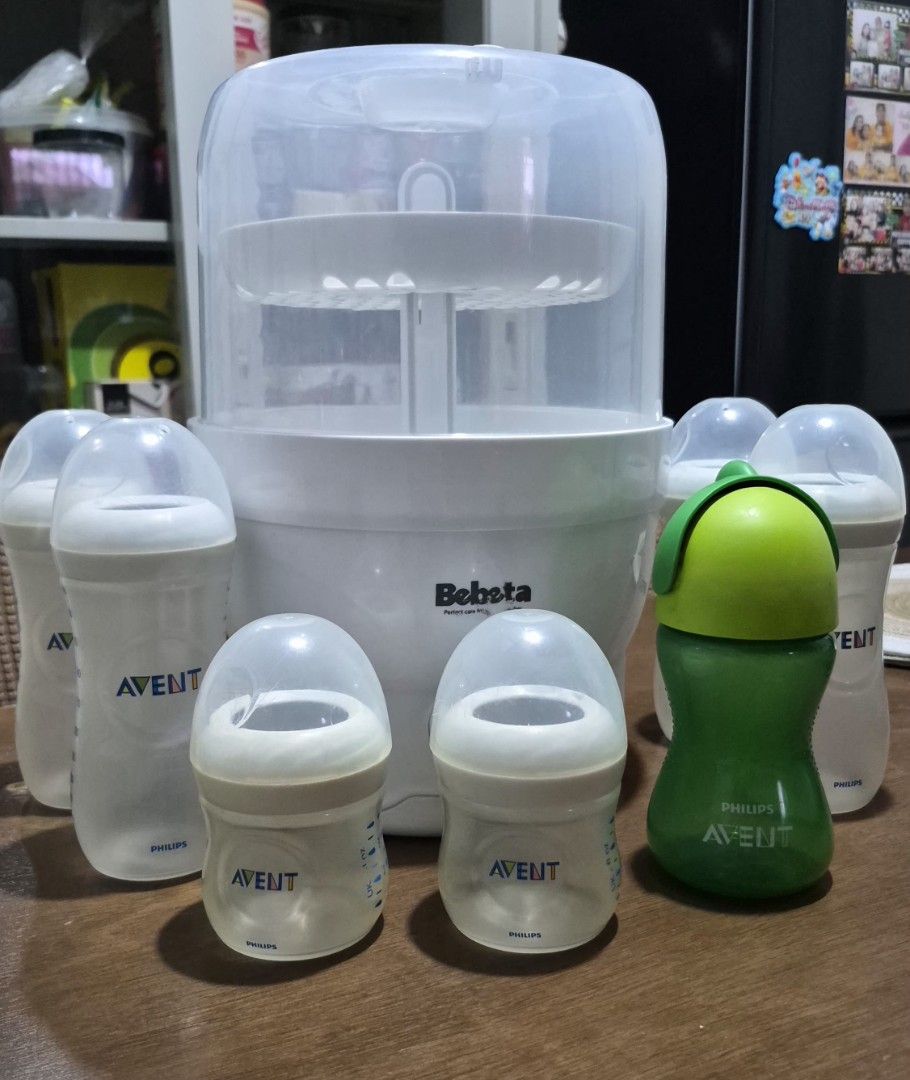 Philips Avent Bottles and Bebeta Sterilizer (Category: Breastfeeding & Bottle Feeding) located in Las Pinas. Submitted by hmhcollection (Listing ID 1426269965, Image 2). Description: Selling my baby's preloved feeding bottles. TAKE ALL! Includes: 4pcs Avent bottles 11oz 2pcs Avent bottles 4oz 1pc Avent My Bendy Straw Cup 10oz 1unit Bebeta bottle sterilizer All items are still in good condition. No included silicon nipples and straw..