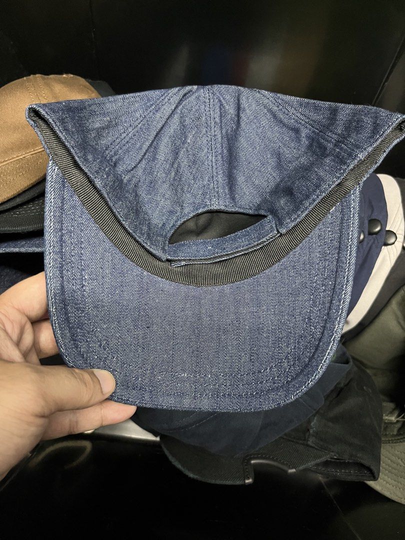 Prada Denim Cap (Category: Caps & Hats) located in Quezon City. Submitted by headline. (Listing ID 1426355446, Image 3). Description: Prada cap in denim. Features the iconic Prada triangle logo on the Side. The interior label indicates "Prada - Milano" and the material composition: 100% cotton for the outer and 100% polyester for the lining. FITS TO ALL EXCELLENT CONDITION FOR ONLY:1,300php +SHIPPING FEE.