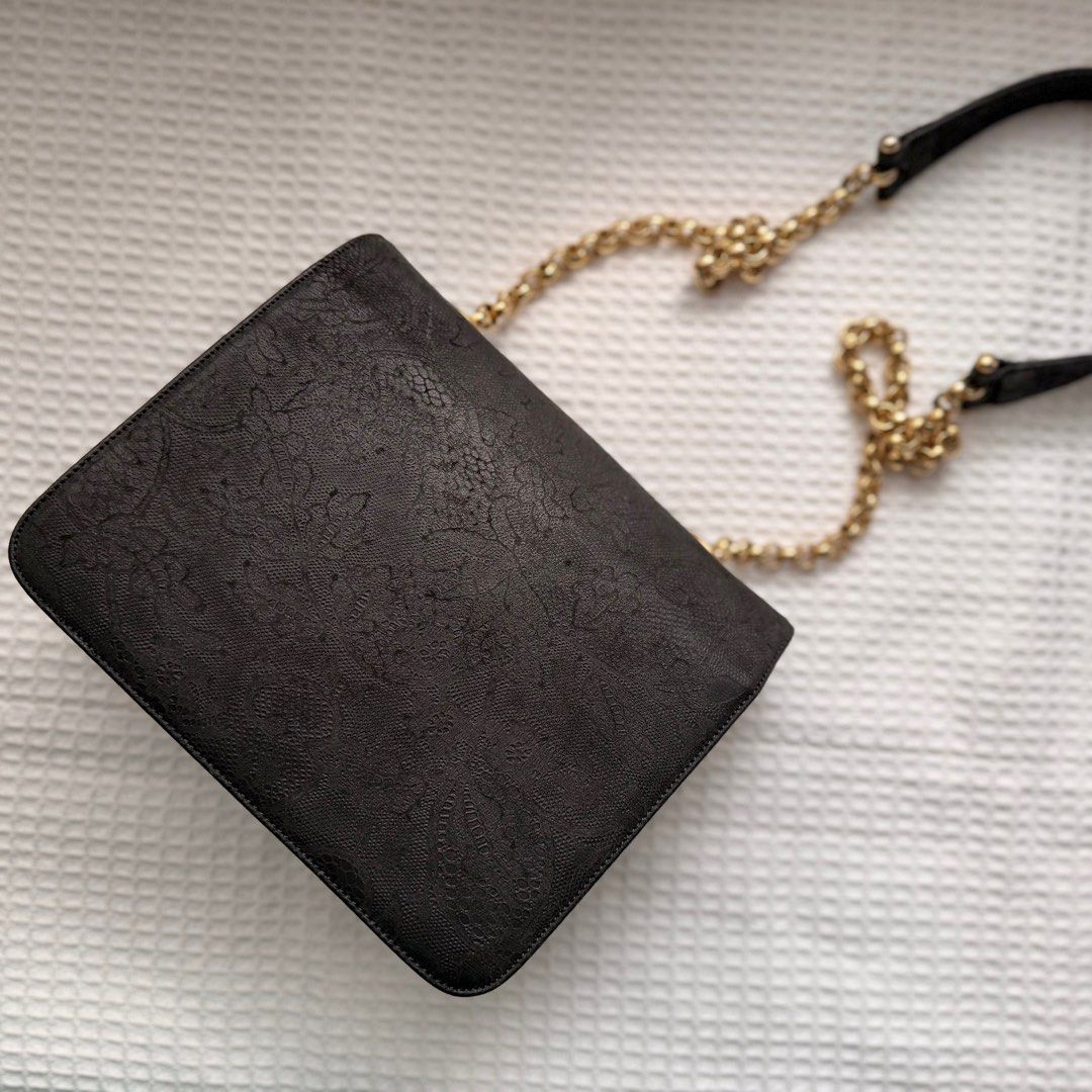 Rare Vintage Chloe Bag (Category: Luxury Bags & Wallets) located in Talisay. Submitted by lovedbyjane.go (Listing ID 1426261389, Image 3). Description: •Authentic rare piece •Black leather with intricate, tonal floral or lace-like embossed pattern •In very good vintage condition •Hardwares are still gold •With original chloe mirror •Clean interior. With minimal light scratches on lining. •Approx 8in x 6in x 2in.