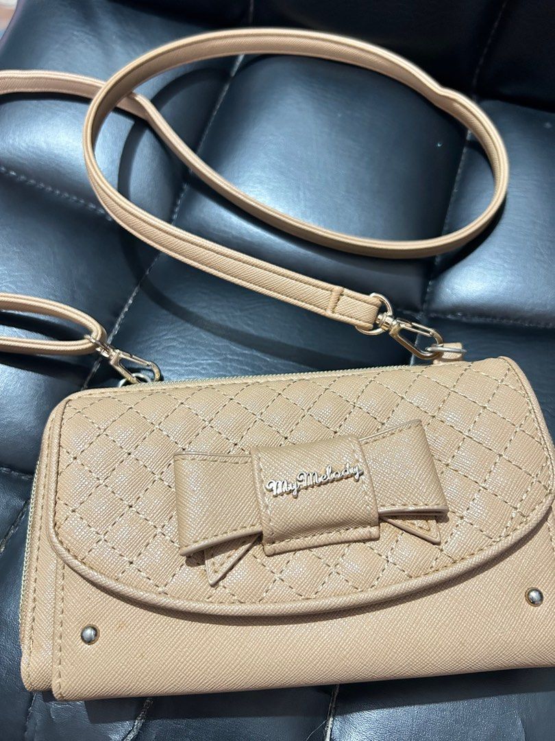 Sanrio - My Melody Wallet Bag (Category: Wallets & Card holders) located in Quezon City. Submitted by secondglanceph (Listing ID 1426251444, Image 1). Description: No flaws. Just signs of use, barely noticeable. In good condition. .