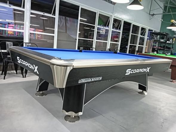 SCORPION X STANDARD BILLIARD TABLE (Category: Everything Else Others) located in San Pablo. Submitted by vennisa.sportssupplies (Listing ID 1426234821, Image 2). Description: SCORPION X STANDARD BILLIARD TABLE ₱155,000 ✅SPECIFICATIONS ☑️ Standard Size (5x9ft.) ☑️ Solid Wood ☑️ Granite Slate ☑️ Autoball ✅WITH ACCESSORIES INCLUDED ACCEPTED PAYMENT METHODS: ✅CASH ✅GCASH ✅BANK TRANSFER ✅DATED CHECK ✅CREDIT CARD FOR CREDIT CARD PAYMENT, DIRECT PM FOR 