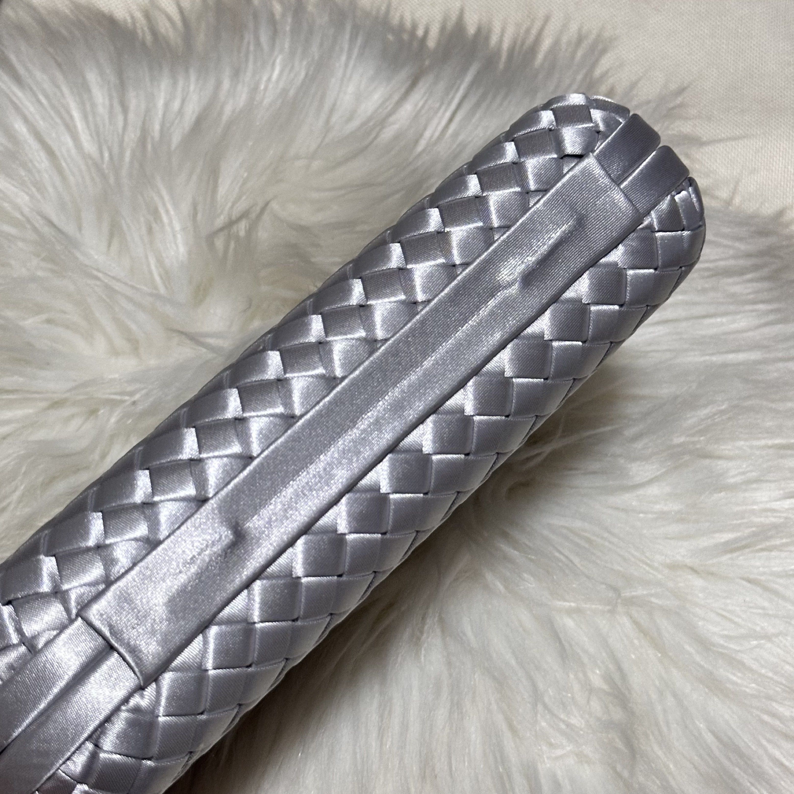 Silver Woven Fabric Clutch Bag (Category: Clutches) located in Marikina City. Submitted by sol.collective (Listing ID 1426261296, Image 3). Description: 20*5.5*12.5cm ▪️can fit up to iPhone Pro Max ▪️color varies from different lighting ▪️actual photos of product posted ▪️can do same-day delivery 💵 Mode of Payment: BPI or GCash PASS TO LOW-BALLERS ‼️ .