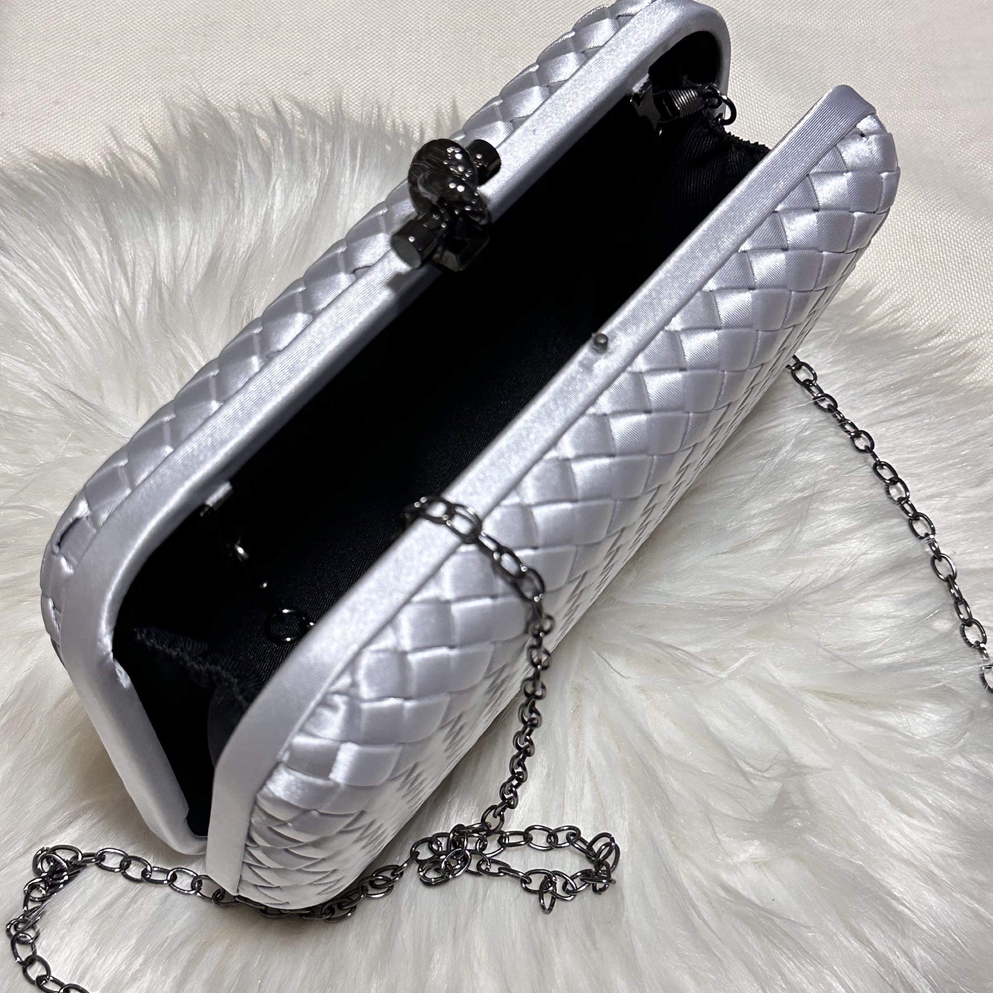 Silver Woven Fabric Clutch Bag (Category: Clutches) located in Marikina City. Submitted by sol.collective (Listing ID 1426261296, Image 2). Description: 20*5.5*12.5cm ▪️can fit up to iPhone Pro Max ▪️color varies from different lighting ▪️actual photos of product posted ▪️can do same-day delivery 💵 Mode of Payment: BPI or GCash PASS TO LOW-BALLERS ‼️ .