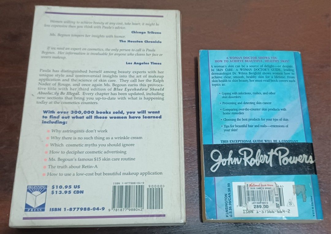 Skin Care and Makeup Books (Category: Makeup) located in Quezon City. Submitted by wjmae (Listing ID 1426303113, Image 2). Description: Two books on skin care and makeup. One is "Blue Eyeshadow Should Be Illegal" by Paula Begoun, and the other is "Skin Care: A Woman Doctor's Guide" by Wilma F. Bergfeld. Both books offer advice on skin care and makeup application. The books are in English..