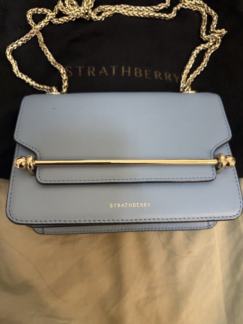 Strathberry Mini East/West Shoulder Bag (Category: Luxury Bags & Wallets) located in Malolos. Submitted by 3Coolitz (Listing ID 1426201145, Image 3). Description: So pretty in person May super small stain sa labas and sa loob (pls see posted pics) Better ang Quality ng leather ng strathberry than polene and demelier for me. You’ll know once you own one. RFS: too small lang talaga for mommy like me. Kasya yung iphone16 plus ko and a card wallet..