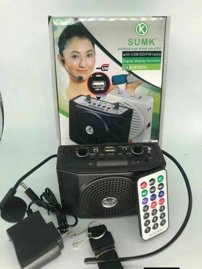 SUMK KU-898 Portable Voice Amplifier with Bluetooth (Category: Soundbars, Speakers & Amplifiers) located in Manila. Submitted by iliasjen (Listing ID 1426220855, Image 1). Description: SUMK KU-898 voice amplifier features Bluetooth connectivity, USB/SD/FM radio, and a digital display. It includes a headset microphone, remote control, and a built-in 1800mAh battery for up to 10 hours of use. It supports 6 music modes: Pop, Rock, Classic, Jazz, Bas