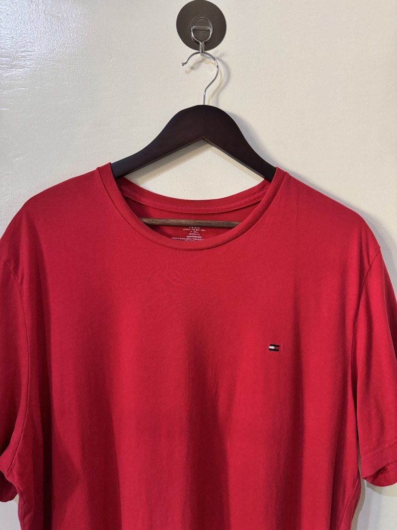 Tommy Hilfiger Red T-shirt (Category: Tshirts & Polo Shirts ) located in Bacolod City. Submitted by bi.fl (Listing ID 1426243838, Image 2). Description: Tommy Hilfiger Red T-shirt XL on tag 23x30 No issues Excellent condition both color and fabric. No discoloration. “🧾Mode of payment: GCash or Bank Transfer 📸Color may vary due to lighting 📏 Measurements are based from armpit to armpit (clothes width) and from waist to lowest hem (pants length)