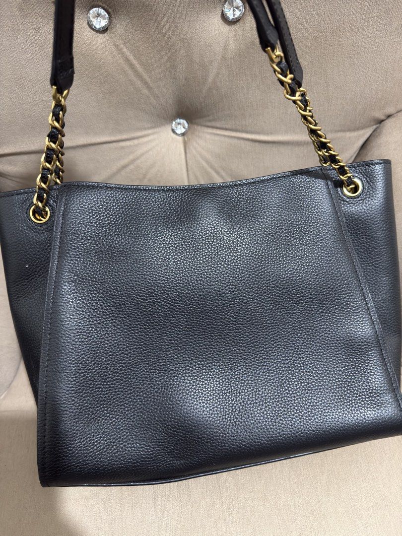 Tory Burch Small Britten Black Leather Tote Bag (Category: Luxury Bags & Wallets) located in Valenzuela. Submitted by eande_manila (Listing ID 1426378196, Image 3). Description: Price drop!!! Good deal for it's condition. Plastic film on zipper pullers still intact Comes with dustbag and paperbag Excellent condition, used only once 100% authentic .