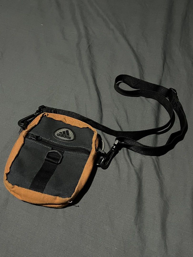 Vintage Adidas Sling Bag (Category: Sling Bags) located in Las Pinas. Submitted by secondskinph (Listing ID 1426312122, Image 1). Description: Vintage Adidas Sling Bag – Rare • Rare vintage Adidas sling bag • Adjustable strap with secure zip compartments • Compact yet functional • Ideal for collectors or streetwear enthusiasts • Color may vary due to lighting • Condition: Excellent / 9/10 • CR: 9/10 • P699 .