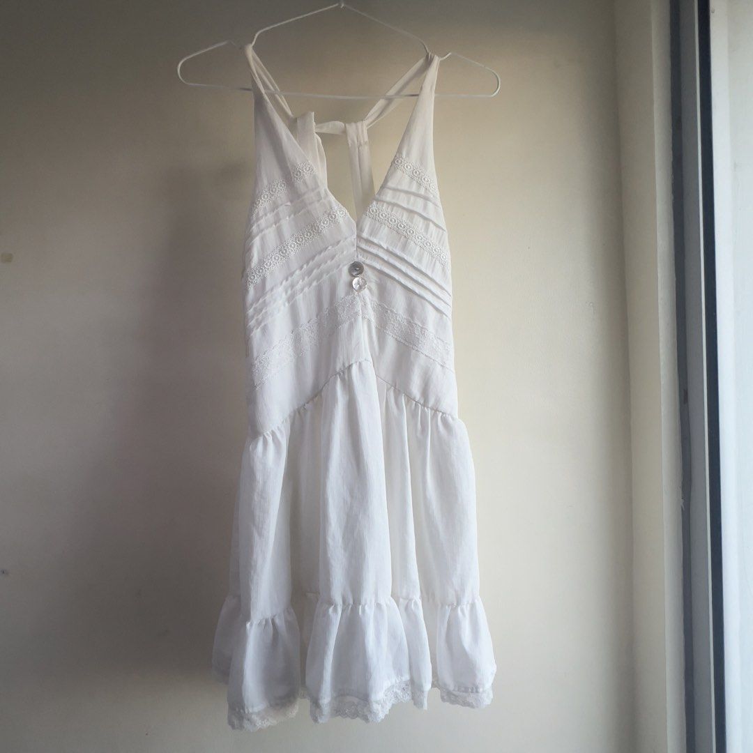 White Halter Mini Dress (Category: Dresses) located in Marikina City. Submitted by declutter.marikina (Listing ID 1426277545, Image 1). Description: Halter dress bought in vietnam!! Perfect for summer. Only worn once.