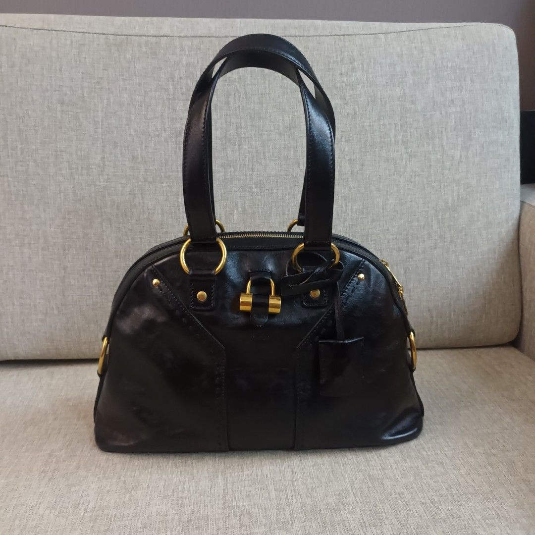 Yves Saint Laurent Black Muse Medium (Category: Luxury Bags & Wallets) located in Mandaluyong City. Submitted by bestill4610 (Listing ID 1426297004, Image 2). Description: Guaranteed Authentic Still in excellent condition Just lightly used Medium size L 15" x H 10" x D 5" Great structure.