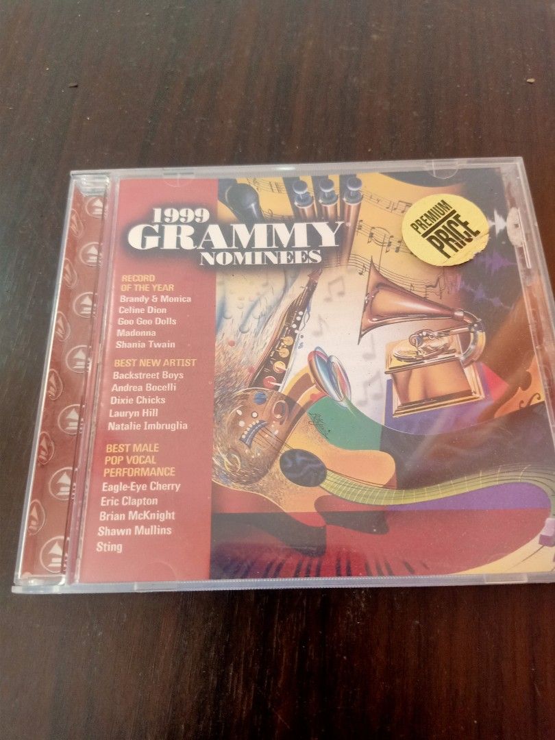 1999 Grammy Nominees CD (Category: CDs & DVDs) located in Las Pinas. Submitted by the_recycle_shop (Listing ID 1426400210, Image 1). Description: CD features the 1999 Grammy Nominees. It includes songs from various artists such as Brandy & Monica, Madonna, Shania Twain, and more. The CD is in its original case. The tracklist is visible on the back of the case. A premium price sticker is on the front..