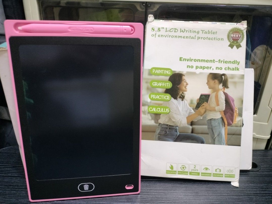 8.5" LCD Writing Tablet Pink (Category: Android) located in Quezon City. Submitted by isaw01 (Listing ID 1426482541, Image 3). Description: 8.5" LCD writing tablet is perfect for drawing, practicing, and taking notes. It's environment-friendly, using no paper or chalk. The tablet is pink and comes with a stylus. It features a clear screen and a button to erase the content. The tablet is lightweight and portable, making it ideal for kids and adult