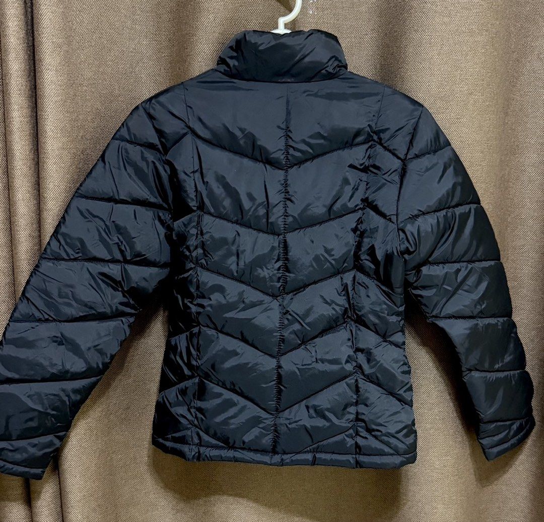 Alessandra Rossi Puffer Jacket (Category: Coats, Jackets and Outerwear) located in Taguig. Submitted by cathtorre21 (Listing ID 1426505124, Image 2). Description: Black puffer jacket from Alessandra Rossi. Features a high collar and a full-length zipper. The jacket has a quilted design. The size is indicated as S/CH. Perfect for staying warm and stylish. A great addition to your wardrobe..