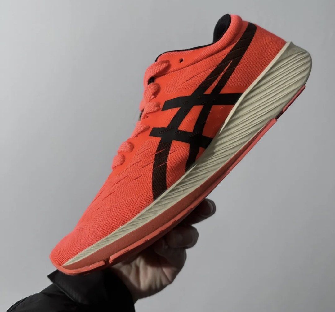 Asics Metaspeed Tokyo Running Shoes - Brand New (Category: Sneakers) located in Singapore. Submitted by jetlee724 (Listing ID 1426396013, Image 3). Description: Brand new Asics Metaspeed Tokyo running shoes. Features a vibrant coral colourway with black accents. Includes original tags and box. Size US 10.5-11. Made in Vietnam. Perfect for runners looking for speed and comfort..