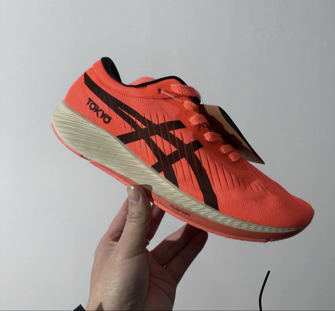 Asics Metaspeed Tokyo Running Shoes - Brand New (Category: Sneakers) located in Singapore. Submitted by jetlee724 (Listing ID 1426396013, Image 1). Description: Brand new Asics Metaspeed Tokyo running shoes. Features a vibrant coral colourway with black accents. Includes original tags and box. Size US 10.5-11. Made in Vietnam. Perfect for runners looking for speed and comfort..