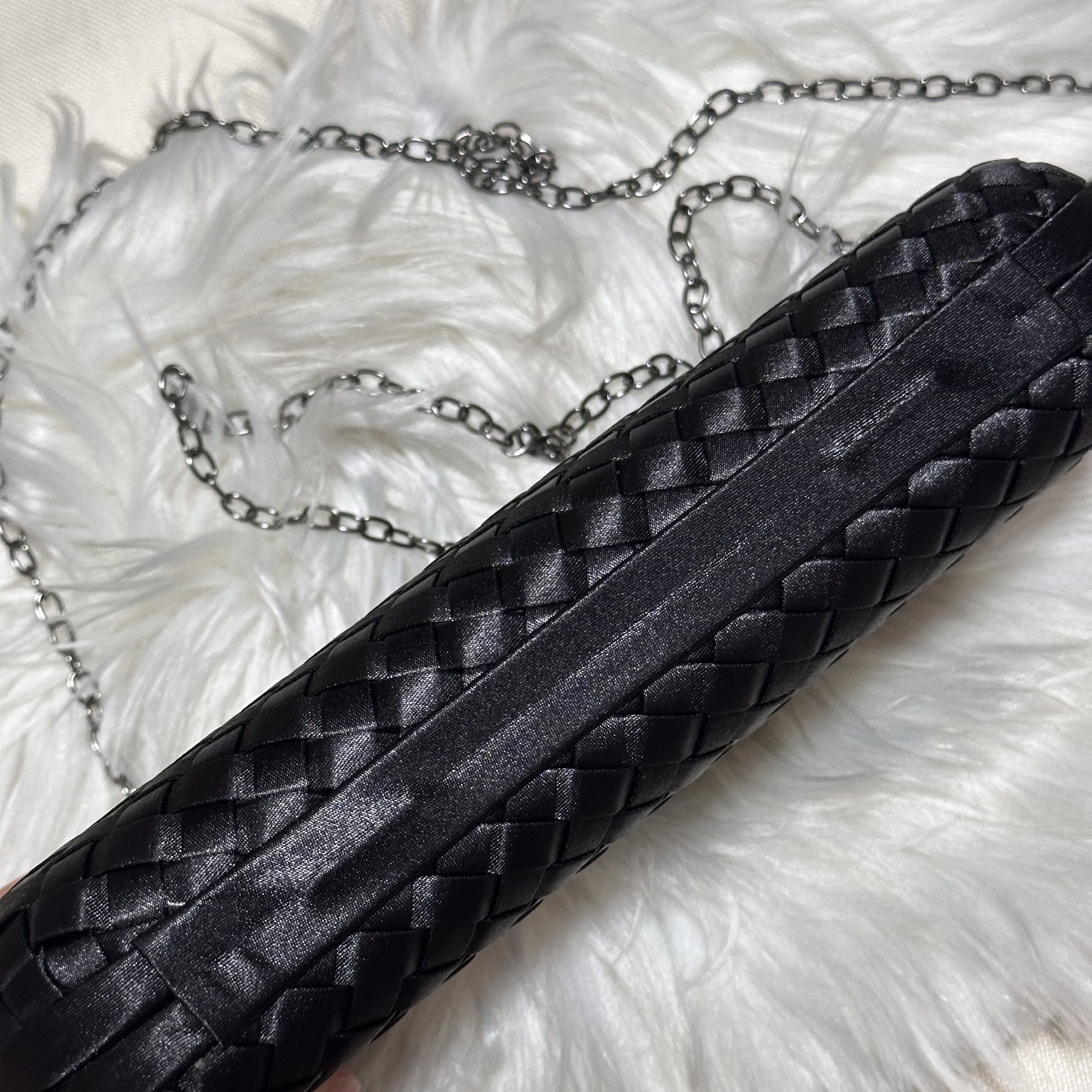 Black long woven clutch bag (Category: Clutches) located in Marikina City. Submitted by sol.collective (Listing ID 1426518171, Image 3). Description: 23*5*10 cm Black ▪️can fit up to iPhone Pro Max ▪️color varies from different lighting ▪️actual photos of product posted ▪️can do same-day delivery ❓Asking for LAST PRICE? 🌷less ₱100 from original price posted 💵 Mode of Payment: BPI or GCash PASS TO LOW-BALLERS ‼️ .