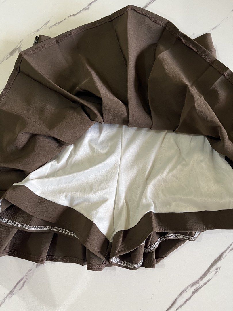 Brown Pleated Skirt with Shorts - Small (Category: Skirts) located in Pasig City. Submitted by adies_apparel (Listing ID 1426436436, Image 2). Description: Wore only ince during my recent Taiwan trip 🇹🇼💖.
