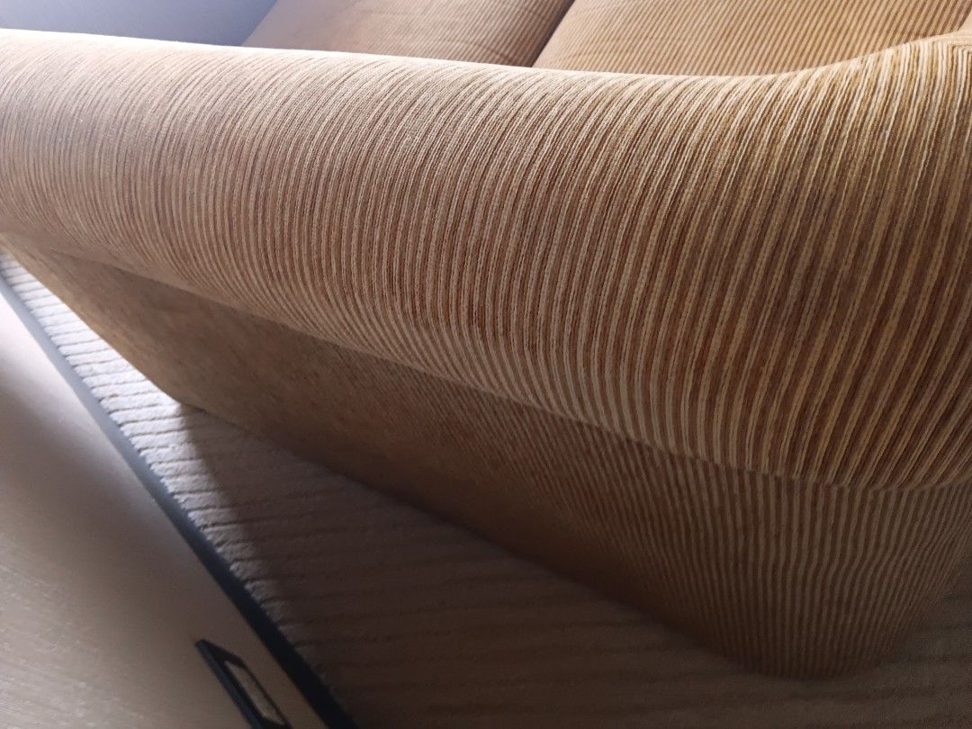 Corduroy 2-Seater Sofa (Category: Sofas) located in Las Pinas. Submitted by jesus1smysavi0r (Listing ID 1426487902, Image 2). Description: Hotel pull put on sale! 6,499! Corduroy sofa features a two-seater design with a warm, brown color. It has a rounded armrest and a sturdy base. The cushions appear to be well-maintained. It would be a great addition to any living room or lounge area. The sofa is perfect for small spaces..