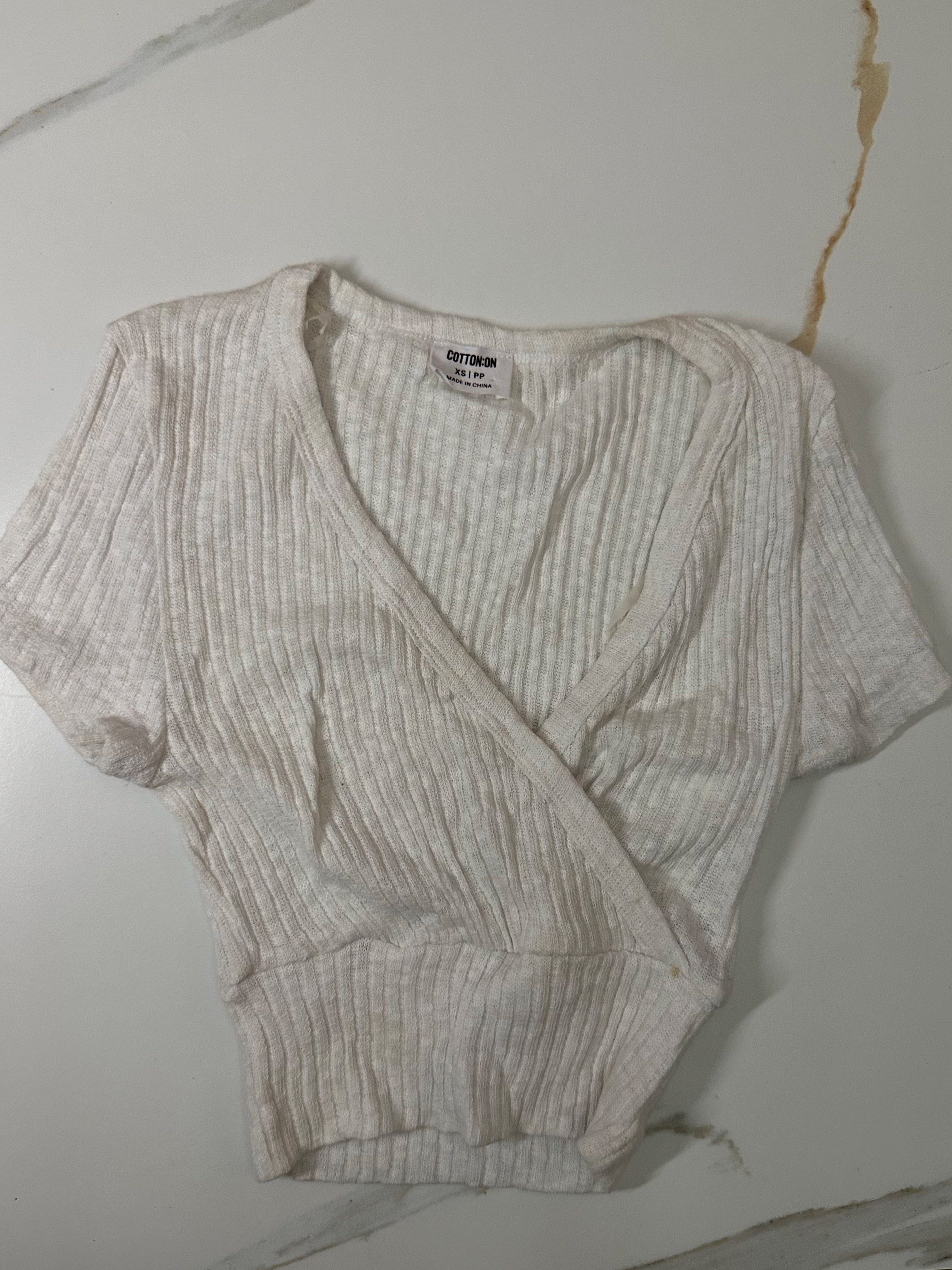 Cotton On Ribbed Wrap Top - Black and White (Category: Blouses) located in Baliuag. Submitted by just.slay (Listing ID 1426478622, Image 1). Description: - both used once - in excellent condition - stretchy fabric *Black S *White XS **109 each , 200 if taking both.