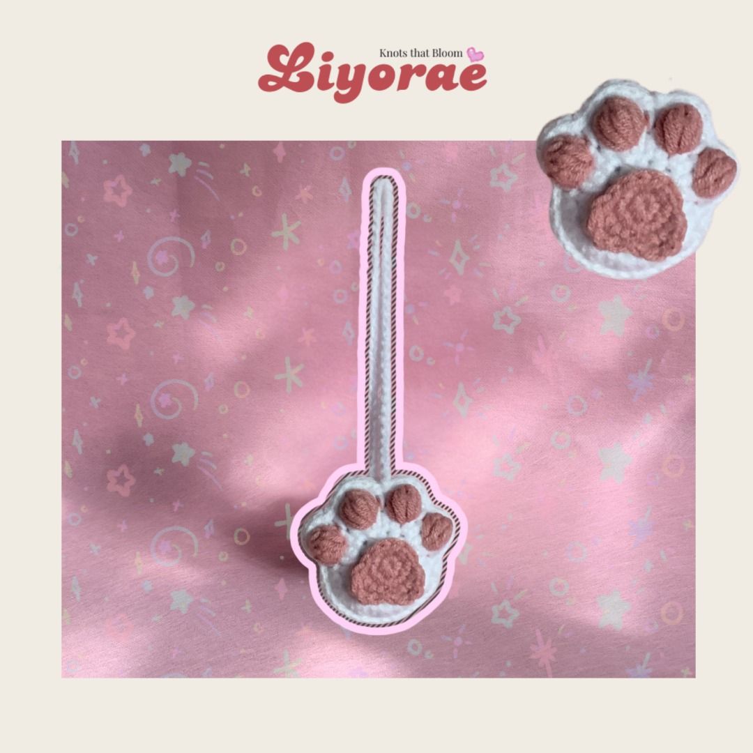 Crochet Paw Keychain - Custom Pet Bag Charm (Category: Handmade Craft) located in Iloilo. Submitted by liyorae.ilo (Listing ID 1426538308, Image 3). Description: The cutest "paw-cessory" for your bags and keys! 🐾✨ Carry a little piece of your fur-baby with you. These handmade crochet paws are soft, durable, and perfectly aesthetic for your tote bags, backpacks, or AirPod cases. DETAILS: Price: ₱99 each Condition: Brand New (Made-to-order) Lead t