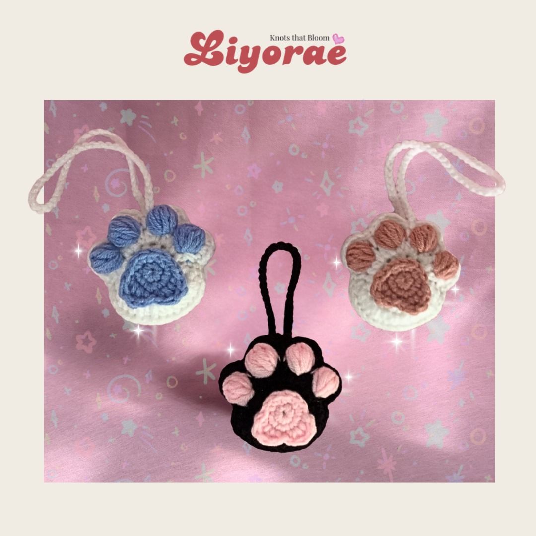 Crochet Paw Keychain - Custom Pet Bag Charm (Category: Handmade Craft) located in Iloilo. Submitted by liyorae.ilo (Listing ID 1426538308, Image 1). Description: The cutest "paw-cessory" for your bags and keys! 🐾✨ Carry a little piece of your fur-baby with you. These handmade crochet paws are soft, durable, and perfectly aesthetic for your tote bags, backpacks, or AirPod cases. DETAILS: Price: ₱99 each Condition: Brand New (Made-to-order) Lead t