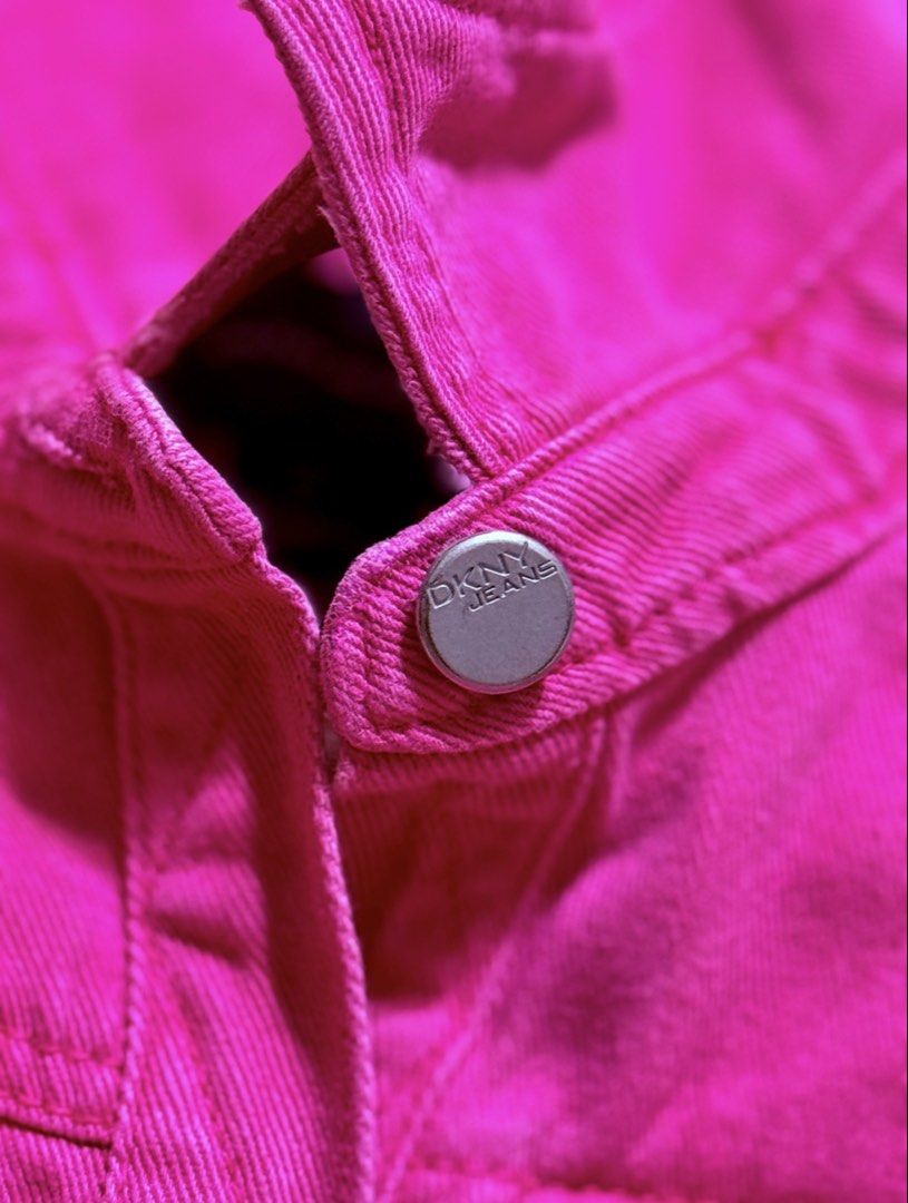 DKNY Jeans Pink Denim Jacket (Category: Coats, Jackets and Outerwear) located in Taguig. Submitted by cathtorre21 (Listing ID 1426503033, Image 3). Description: Measurement: Length 21" Shoulder width 17" Body width 19" Armpit 8" Bright pink denim jacket from DKNY Jeans. Features a classic design with button closures and two chest pockets. The jacket has a collar and long sleeves. The size is L, as indicated on the label. Made in China..