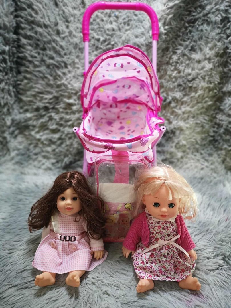 Doll Stroller Toy Set (Category: Kids Toys) located in Santa Cruz. Submitted by jmy_surplus.2 (Listing ID 1426475898, Image 1). Description: Size ; Color ; Pink Type ; Toy Brand ; No brand Material ; Fabric , Plastic Style ; Pink Doll Stroller JMA JMY 5 Batch #193.