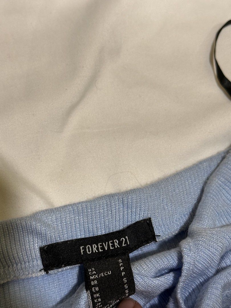 Forever 21 Blue Tie-Front Top (Category: Sleeveless) located in Manila. Submitted by halsea (Listing ID 1426517283, Image 2). Description: medium to large stretchy forever 21.