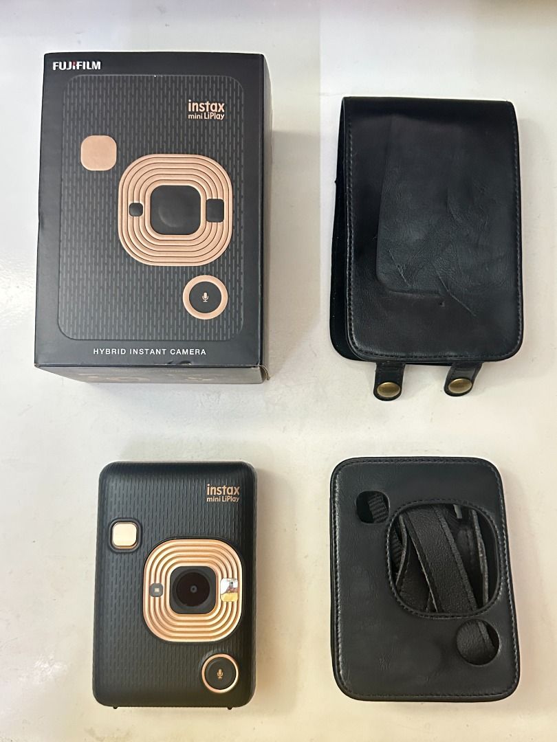Fujifilm Instax Mini LiPlay (Category: Cameras) located in Taguig. Submitted by jrentengco (Listing ID 1426582383, Image 1). Description: - Pwedeng pwede sa maarte - Almost new - Barely used Color: Blush Gold Features: Hybrid, Audio Recording, App Connectivity Inclusions: Original Box, Original Cable, Leather Case Disclaimer: Micro SD not included, Film not included Original Price: P9,500 RFS: Decluttering Message me for more details. Slightly ne