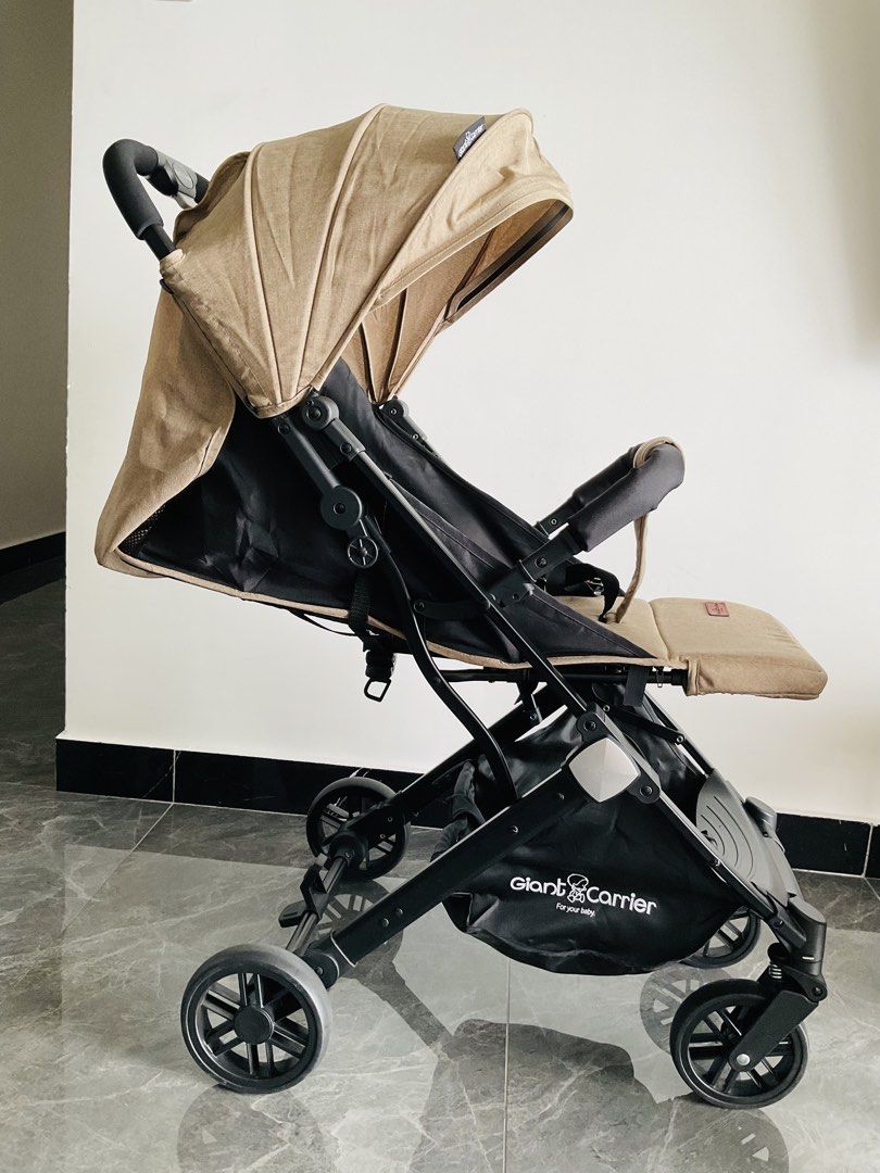 Giant Carrier Stroller (Category: Strollers) located in Manila. Submitted by mai.yew (Listing ID 1426407493, Image 3). Description: (Orig price: ₱5,600) -Like new, no issue -Compact, Foldable, Full Recline -With Large Canopy, Storage Basket and Trolley Function -For 1 to 3 yo (10-15kg).