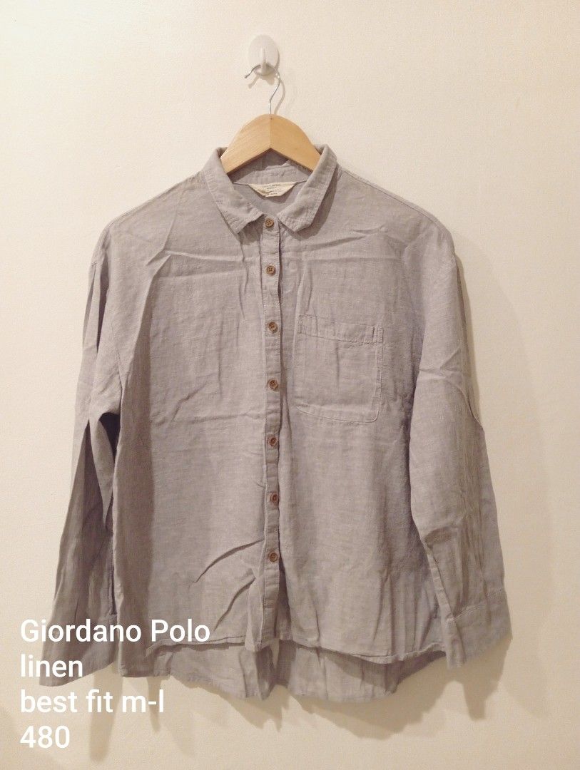 Giordano Polo Linen Shirt (Category: Tshirts & Polo Shirts ) located in Manila. Submitted by cococlo_ (Listing ID 1426444549, Image 1). Description: - Giordano Polo linen shirt - Light grey color - Button-down front - Single chest pocket - Long sleeves - Best fits M-L - Versatile for various occasions.