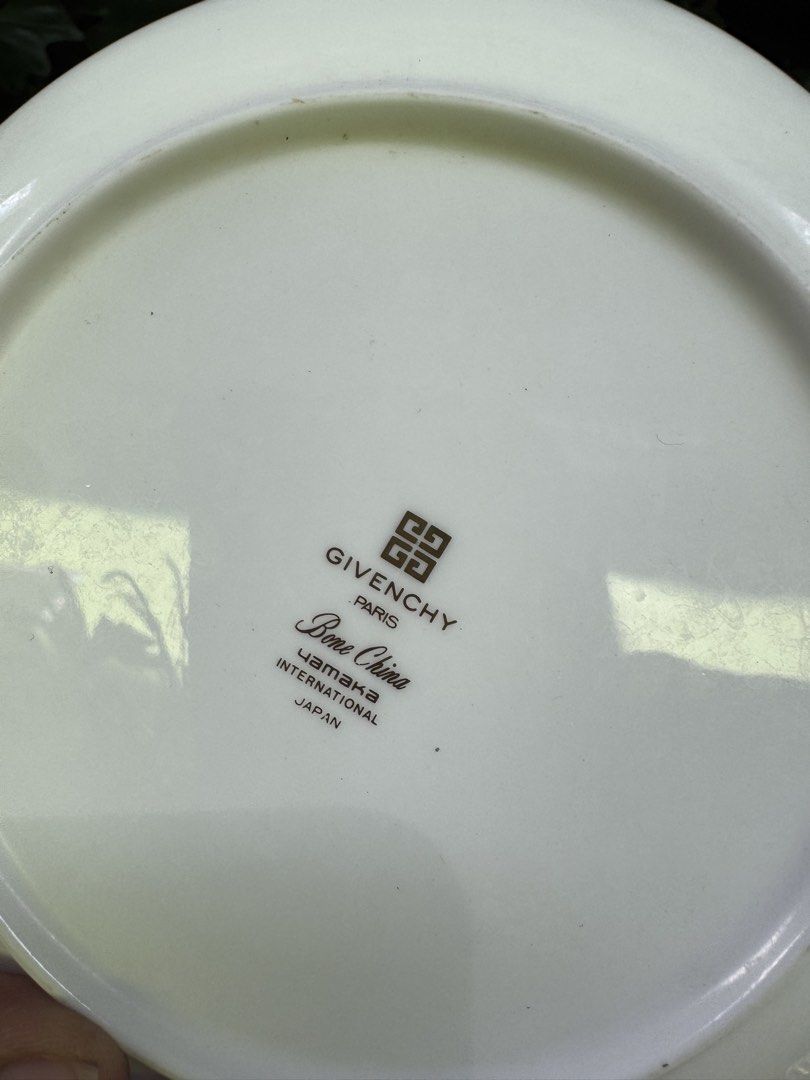 Givenchy bread plates (Category: Dinnerware & Cutlery) located in Davao. Submitted by parteawares2 (Listing ID 1426435380, Image 3). Description: Two pieces givenchy bread plates with noted fades on the rim .