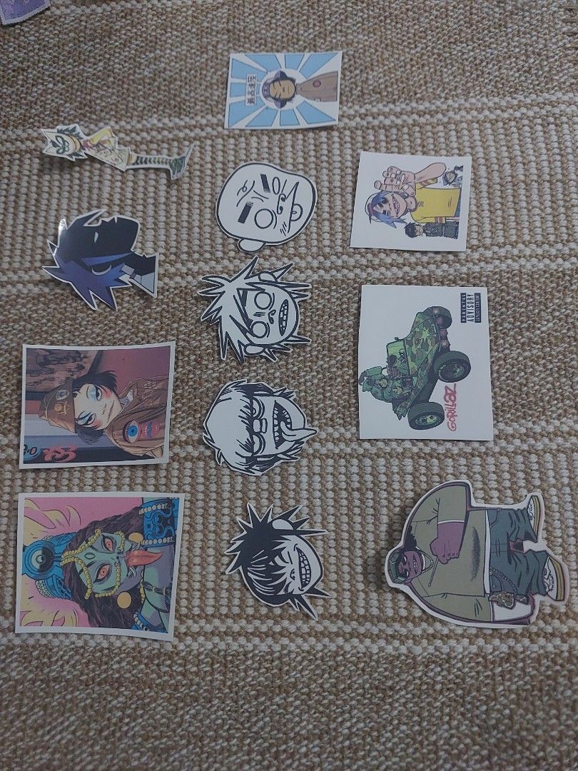 Gorillaz Sticker Set (Category: Art & Prints) located in Quezon City. Submitted by smcfly2k2 (Listing ID 1426544440, Image 2). Description: Set of Gorillaz stickers featuring various characters and designs. Includes stickers of 2D, Murdoc, Russel, and Noodle. The stickers are cut out and ready to use. Perfect for decorating notebooks, laptops, or any surface you want to personalize with the Gorillaz. 100 PESOS EACH!!.