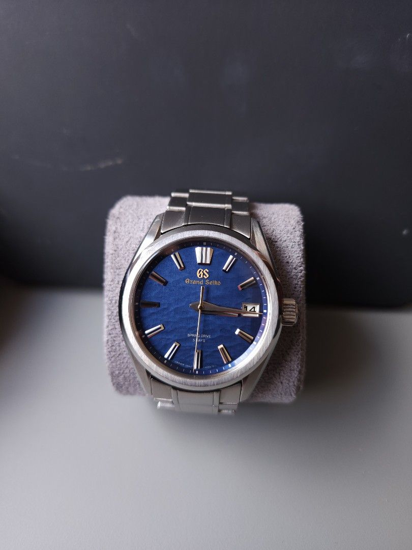 Grand Seiko SLGA007 'Lake Suwa' Spring Drive (Category: Watches) located in Singapore. Submitted by eggnatius (Listing ID 1426474519, Image 2). Description: Hi all, up for sale is my Grand Seiko SLGA007 "Lake Suwa". Watch runs perfectly. Light scratches consistent with moderate wear. Watch Details: - Brand: Grand Seiko - Reference: SLGA007 - Limited Edition: 2,021 pieces worldwide - Purchase Date: 15 Jan 2022 - Case Material: Stainless steel - Ca