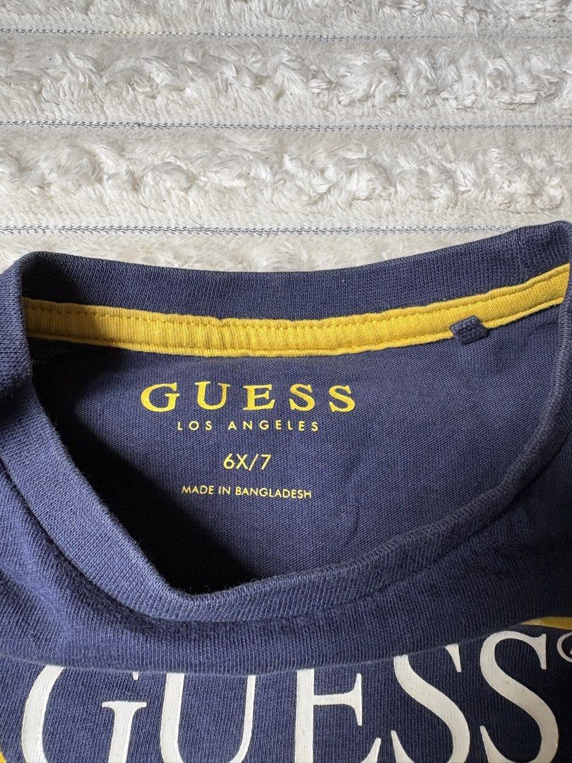 Guess Navy Blue T-shirt (Category: Babies & Kids Fashion) located in Cavite. Submitted by -coffeebean- (Listing ID 1426406210, Image 3). Description: .