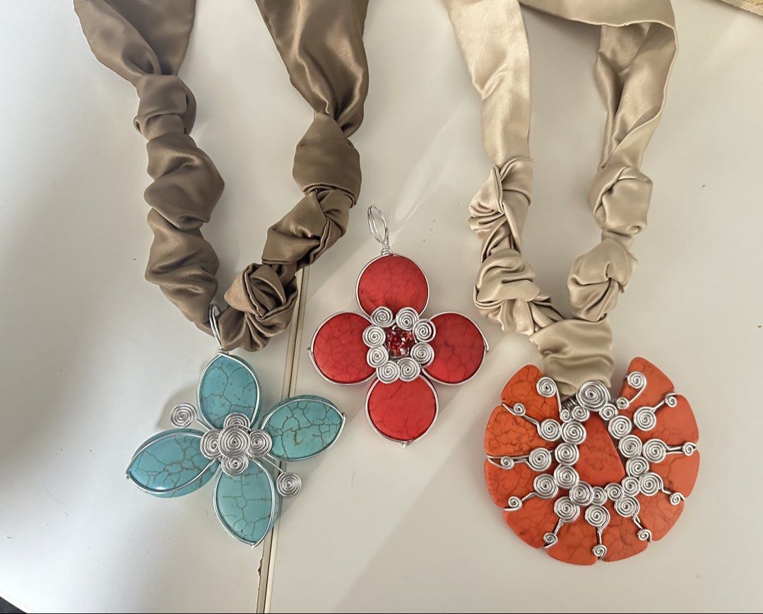 Handmade Semi-precious Stone Necklace (Category: Necklaces) located in Quezon City. Submitted by secondcharm96 (Listing ID 1425920308, Image 3). Description: ✨ Features: • Handmade orange turquoise stones with intricate wire wrapping • Matching statement cuff • Designed with pretty ribbon for a stylish and artistic look • Never worn, excellent and like new condition • One-of-a-kind handmade design Perfect for adding a bold, artistic touch to dres