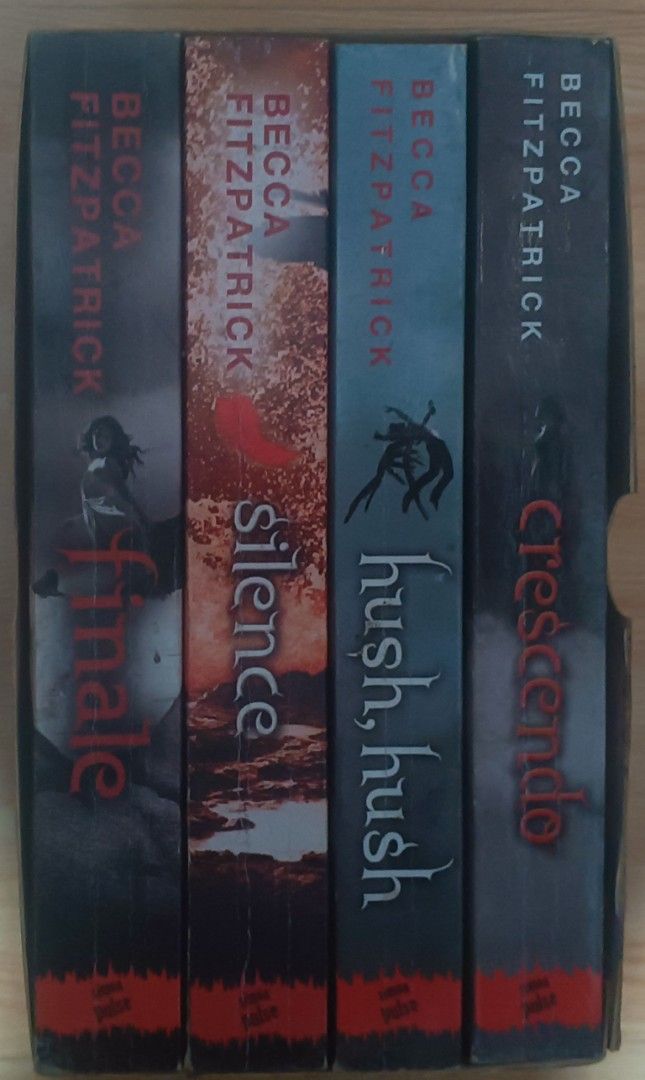 Hush, Hush Complete Boxed Collection by Becca Fitzpatrick (Category: Storybooks) located in Bacoor. Submitted by dogberthor (Listing ID 1426411458, Image 2). Description: Complete set of the Hush, Hush series by Becca Fitzpatrick. Includes Finale, Silence, Hush, Hush, and Crescendo. The books are in a box set. The cover art features a dark silhouette of a man with wings and a woman. The books are in English..