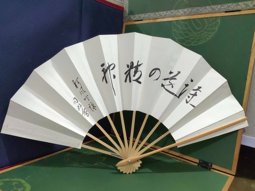Japanese folding fan (Category: Other Accessories) located in Cebu City. Submitted by dudes_villanueva (Listing ID 1426394562, Image 1). Description: Japanese folding fan Design: White fan with black calligraphy In good condition.